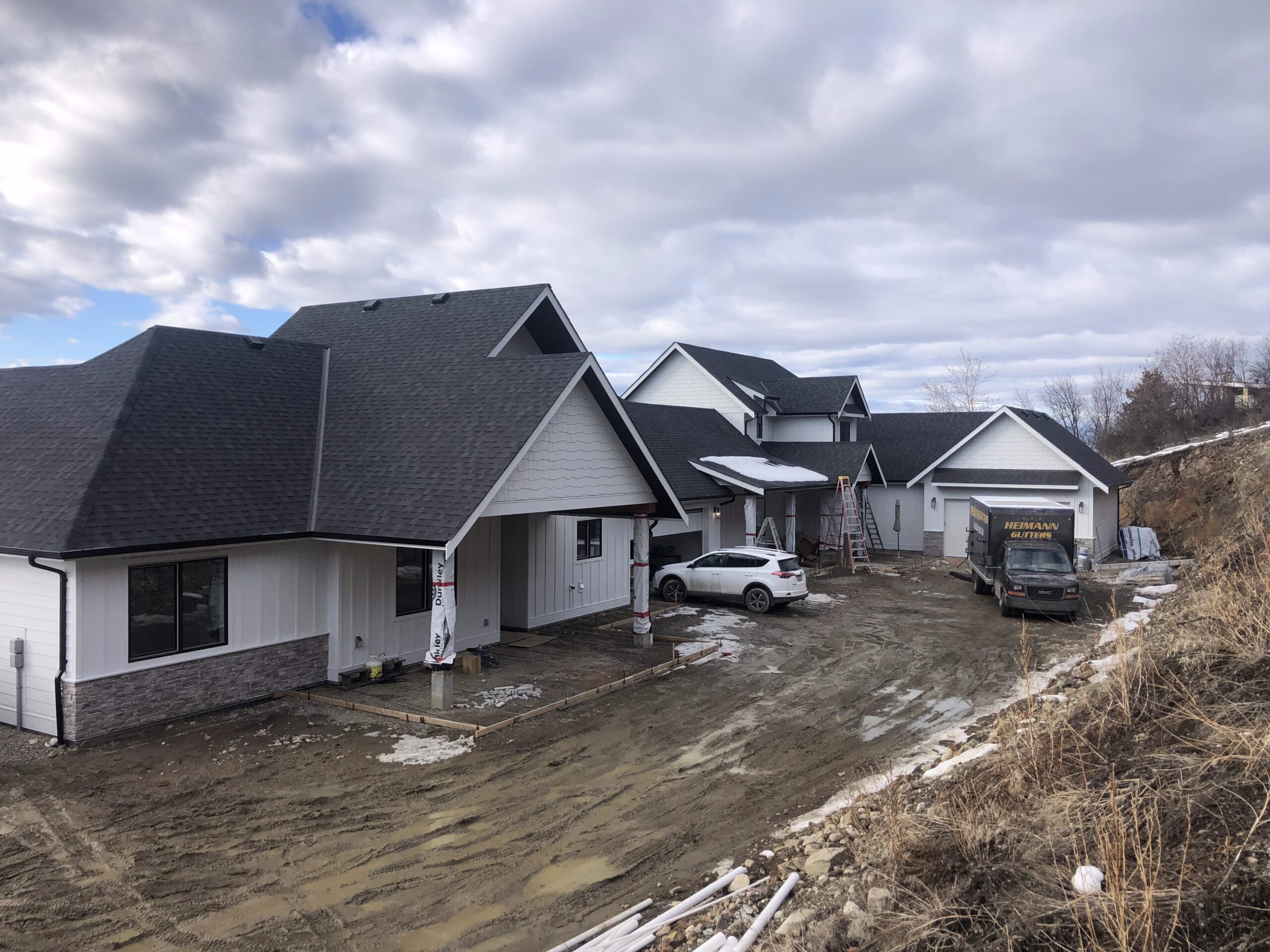 Clean gutters on an Okanagan home prepared by Heimann Gutters for winter weather.